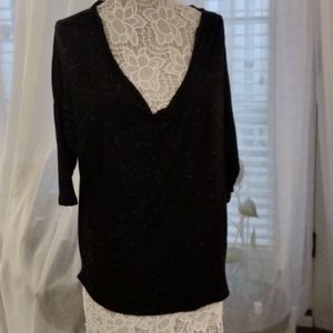Larry Levine black and white top with Dolman sleeves, size M